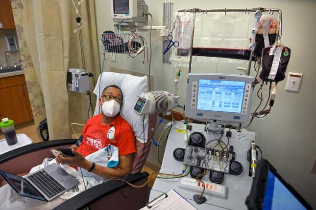 Kevin Wake, 54, of Kansas City, has sickle cell disease. Every six weeks he receives blood transfusions that help alleviate the pain. Here he receives a transfusion at the Sickle Cell Center at University Health. The wide, horizontal bag contains Wake&amp;apos;s blood, which will be discarded